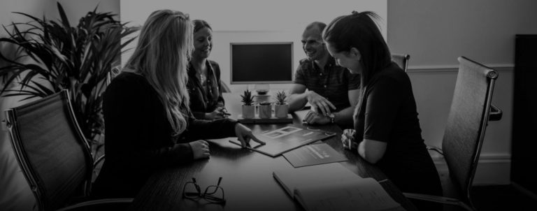 Core SWC Partnership team around boardroom table